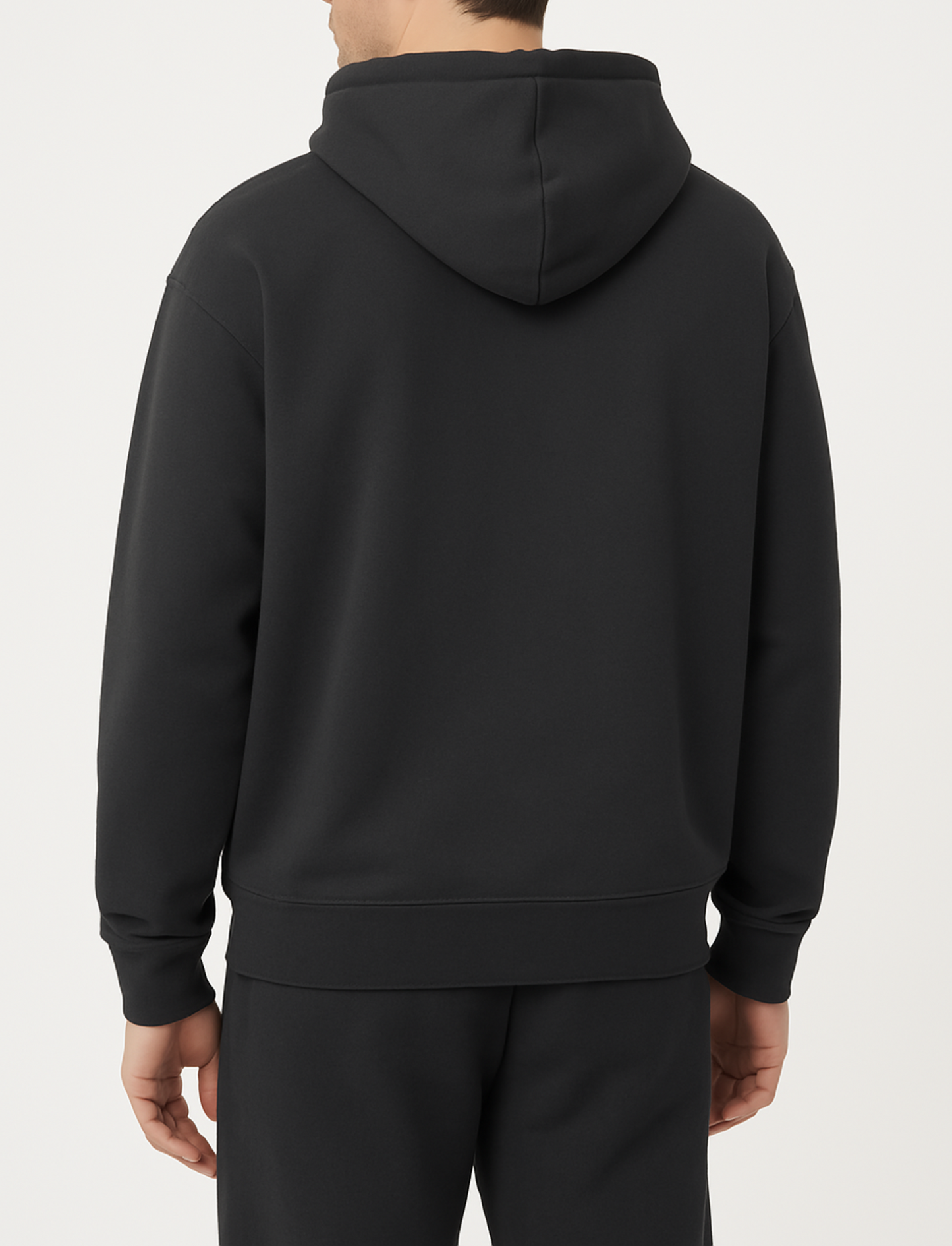basic donkergrijs vest achterkant met gouden rits van desons met een oversized pasvorm op een mannelijk model met een zwarte broek