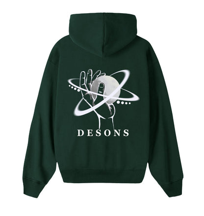Oversized groene hoodie voor heren en dames van DESONS, met een opvallende witte print van een hand die een planeet vasthoudt en orbitale lijnen. Luxe streetwear hoodie.
