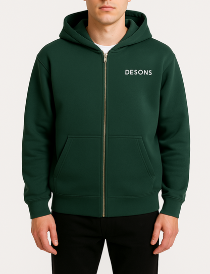 basic groen vest met gouden rits van desons met een oversized pasvorm op een mannelijk model met een zwarte broek